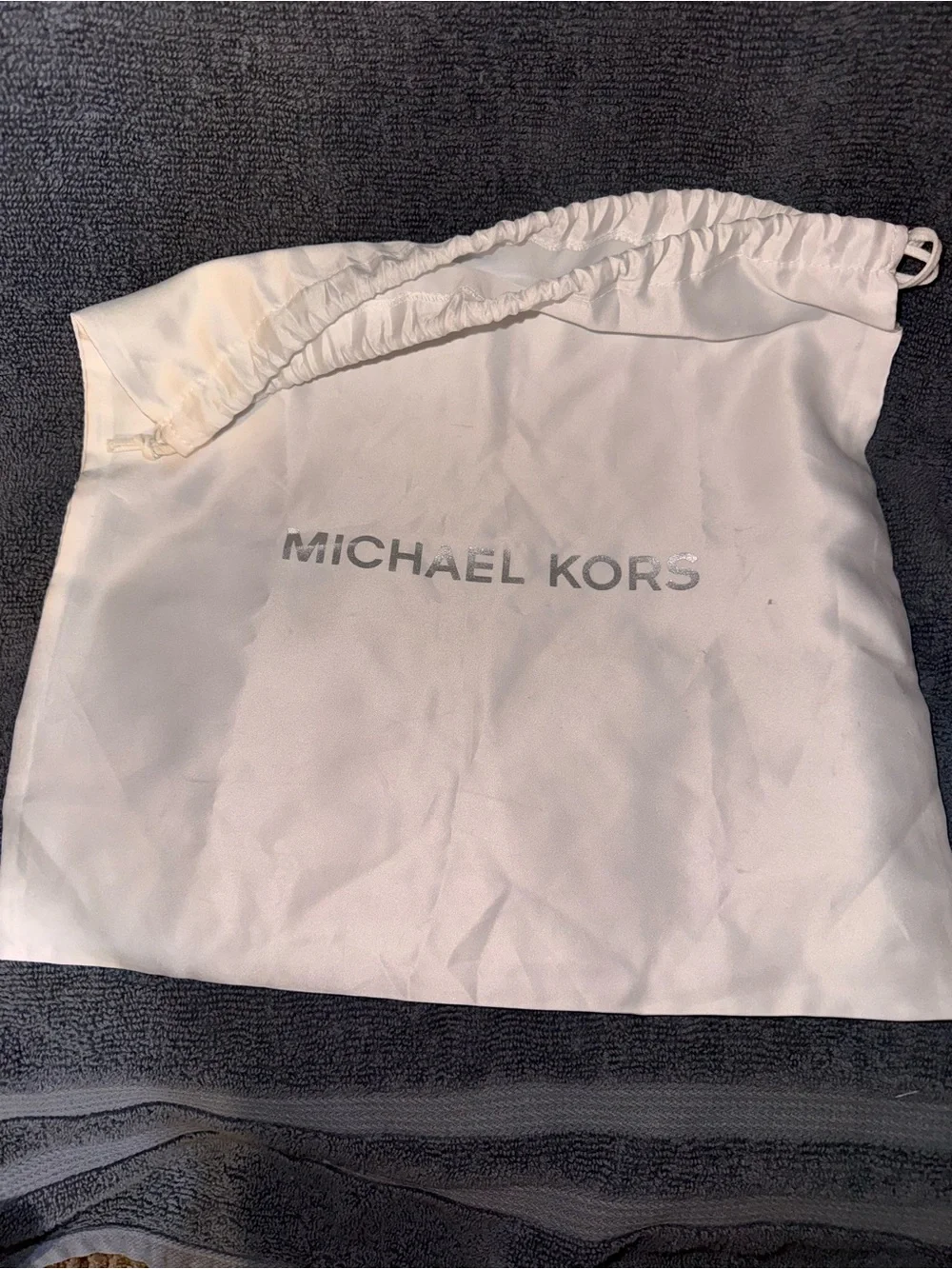 Michael Kors trim silver logo